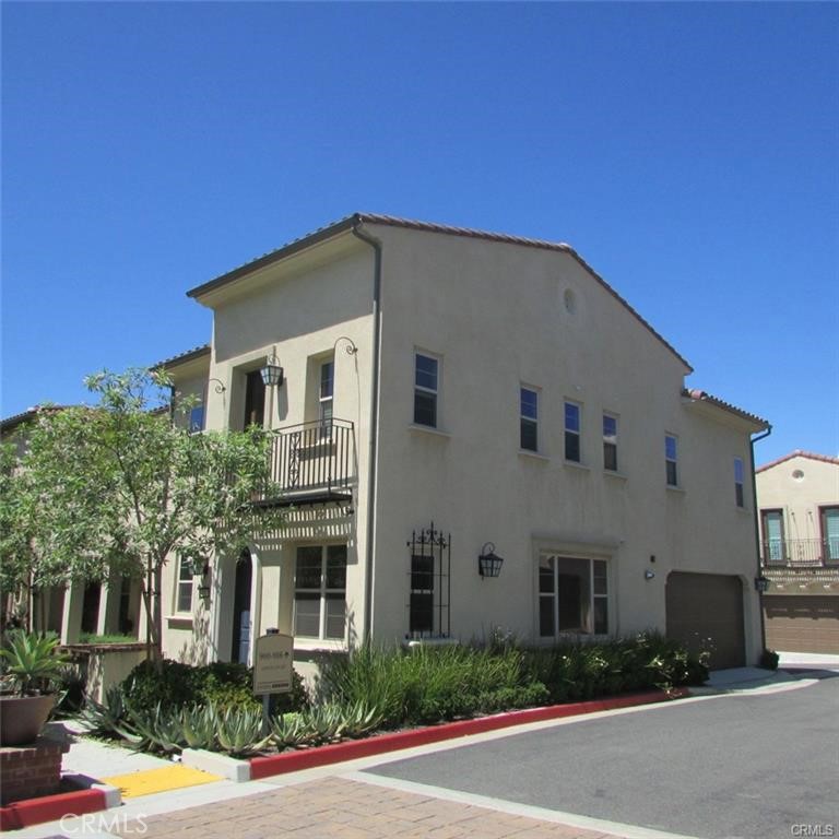 This Mediterranean style condo is located in the highly desirable location of Citrus Glen at Pitzer Ranch of Claremont, Built in 2014. SUPER WELL located Front Unit, away from the Freeway NOISE and Baseline Rd. TRAFFIC!! Spacious Townhome/Condo, with only ONE common wall, has 3 Bedrooms (One Bedroom is the Master Bedroom with a step-out balcony.) ALL upstairs with 2 FULL Bathrooms. Plus, a spacious Loft upstairs with a built-in work station ~ a Work-from-Home Office!! The Laundry Room is also upstairs in a separate room. There's a 1/2 Bathroom (Guest Bathroom) downstairs. Combined Living Room w/ Dinning Nook with high ceiling. Plenty of cabinets in the Kitchen; plus a look-out window while cleaning dishes ~ HaHa!! Direct Access to a spacious 2-Car Attached Garage!! Also, there's a nice little private Patio Area next to the front door of the Condo/Townhome. The Community PATIO has Two BBQ facilities, as well as many tables with chairs (and patio sofa lounge!!) for Family/Friend gatherings. Yes, private Bathrooms are there as well! There is also a Community Meeting Room available for Residents use. LOCATION is VERY easy access to the 210 Freeway as well as the prestigious Claremont Colleges, downtown Claremont, Metrolink Station, prestigious Claremont Public Schools, as well as "Webb Schools", a Private High School; AND, it's not too far from Mt. Baldy!!