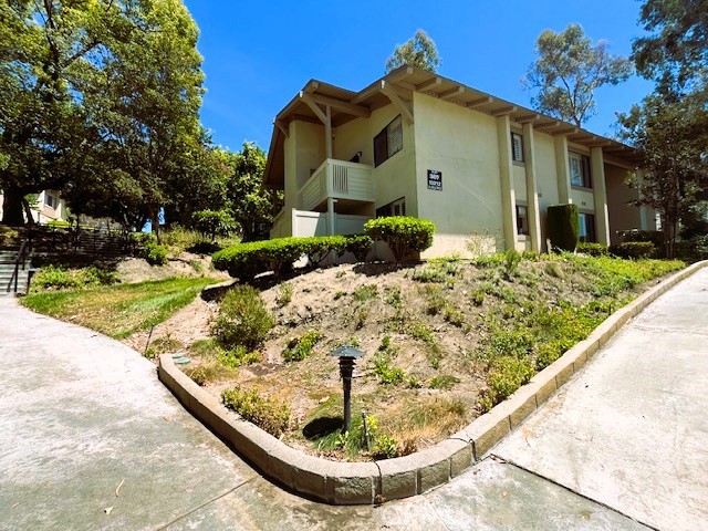 Just a lovely place to live. Active 55+ guarded community of La Mirada Landmark, nestled in a residential neighborhood, right across the street from the La Mirada Golf Course and surrounded by lush green grounds, with a socially active clubhouse with many events, a pool, spa, pickleball courts, BBQ's, workshops, a fitness center and lots of new friends. This perfectly situated single level- ground floor 1 bed / 1 bath condo offers a 1 car garage just steps away from your front door, a very private patio including a combo washer and dryer in the storage area to make life so convenient and simple. The kitchn was updated with granite countertop and appliances in recent years. The home is well kept, clean and neat and just the right size and location in the complex for privacy and convenience. Rare opportunity to own a single story, ground level condo in this amazing guarded entry community right in the heart of everything.
