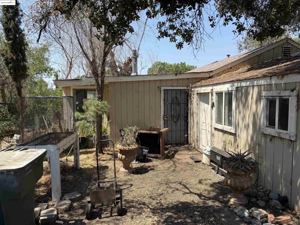 GREAT OPPORTUNITY...PRIME OAKLEY LOCATION ALMOST 1/2 ACRE... WELL AND SEPTIC...COTTAGE "AS'IS"...MULTIPLE OPPORTUNITIES