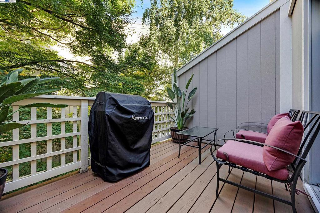 Darling, darling, darling 2 bedroom 2 bath upper floor unit with privacy and whispering trees outside the balcony. Ideally located with buildings and trees to the East and West of the unit, making it insulated from noise from Oak Rd, BART, and the freeway. Lending tranquility, privacy and some insulation from direct sun. Not to be overlooked is the bright, open and airy feel in this unit whether upstairs or down. The luxury vinyl plank floor on the main level gives the space a modern clean look and feel. Granite counters over custom cabinets and stainless appliances create a little culinary oasis. Brand new water heater, remote controlled blinds, LED recessed lighting, and newer carpet are some of the thoughtful improvements the owner has made. The HOA has a pool and clubhouse and the dues include water and trash pickup. What a great value for a beautiful condo walking distance to the hustle and bustle of Treat Blvd, BART, restaurants and many other services. Live Well!