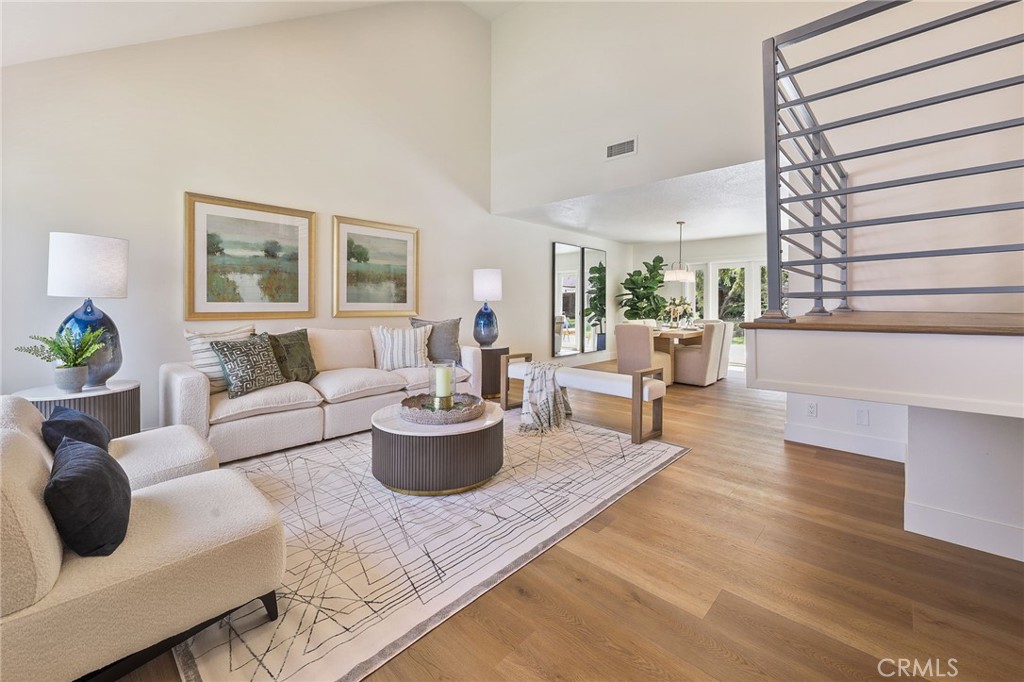 Modern Elegance Meets Timeless Comfort in Tustin!
Step into a beautifully reimagined residence where contemporary design harmonizes with everyday functionality. This spacious 4-bedroom, 2.5-bathroom home offers nearly 2,850 square feet of thoughtfully updated living space on a generous 7,200 SF lot.
The heart of the home is a chef's dream kitchen, featuring a striking waterfall quartz island, custom backsplash, pro-style stainless appliances, and sleek slim shaker cabinetry—perfect for both intimate gatherings and grand entertaining.
Retreat to the expansive primary suite, complete with a spa-inspired bath boasting a frameless glass shower, designer tile, double vanity, and a walk-in closet. Additional bathrooms have been stylishly renovated, ensuring comfort and luxury throughout.
Modern touches abound, from the steel staircase railing and updated wet bar to the fresh interior and exterior paint, new lighting, and landscaped grounds.
Located in a prime Tustin neighborhood, enjoy proximity to top-rated schools and convenient access to The Market Place, The District at Tustin Legacy, and major freeways ensures you're never far from shopping, dining, and entertainment.
Experience the perfect blend of style, comfort, and location—your next chapter awaits at Fairmont Way.