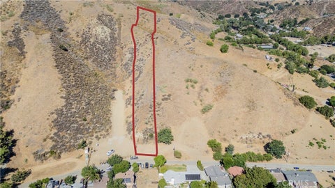 Photo of 0 Paradise Road, Val Verde, CA 91384 (MLS # SR26171685)