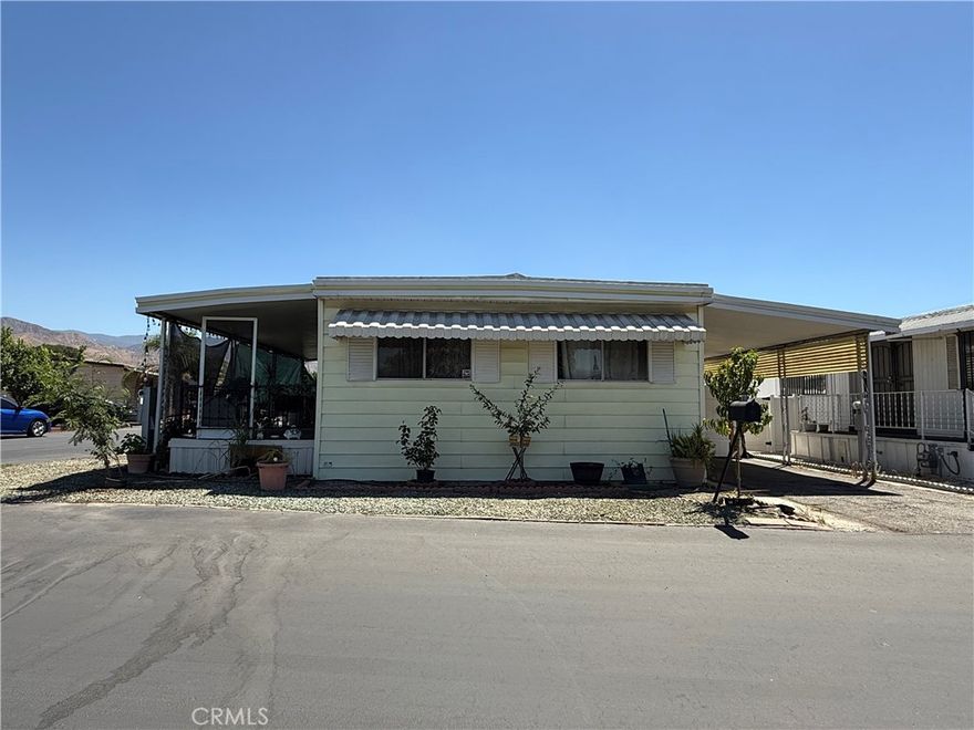 Welcome to this 55+ gated community corner lot home. The home offers 2 bedroom and 1 bath with two parking spots. The park offers a swimming pool, jacuzzi, library and event room.