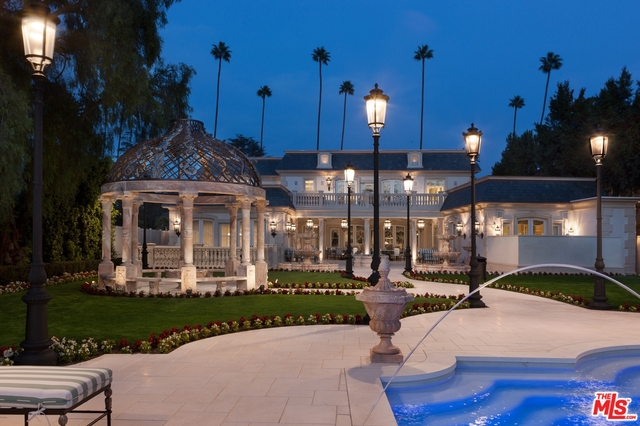 Maison 613 sets a new standard of elegance, beauty and sophistication in the residential landscape of Beverly Hills. Sited on one of the deepest lots over 350 feet deep and 90 feet wide in the "Golden Flats," it offers approximately 21,000+ square feet of lavish detail and amenities including 7 bedroom suites, master suite with outdoor spa plus dual baths and closets. 2 family rooms, breathtaking kitchen, paneled library, state-of-art theater with star roof, indoor basketball court, beauty salon, Quibeca AMF 2 lane Bowling Alley, gym, multiple imported fireplace, self-contained 1-bedroom guest house, resort-size swimming pool and spa, commercial elevator and the most advanced, orchestrated lighting, sound and security systems imaginable with strategically placed acoustical upgrades throughout. Air filtration units and humidity control and Lifesource water treatment throughout.