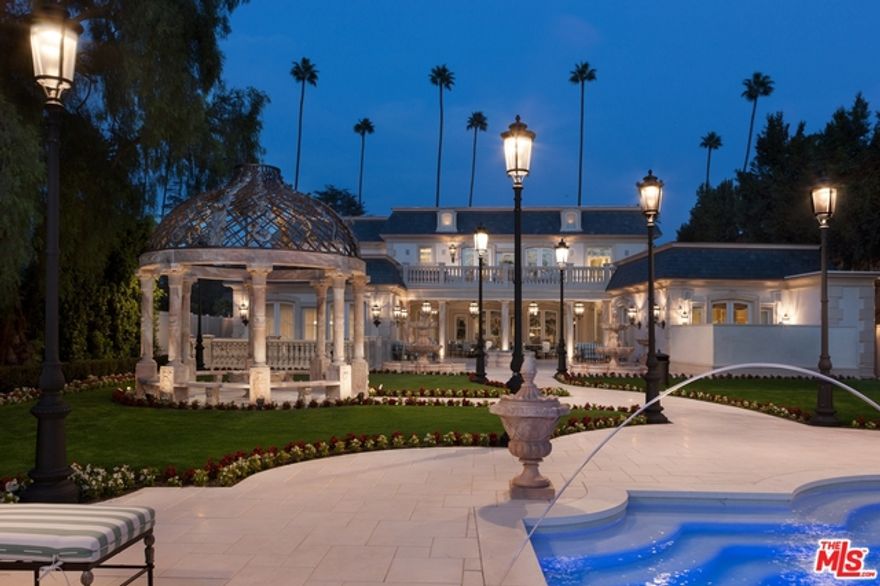Maison 613 sets a new standard of elegance, beauty and sophistication in the residential landscape of Beverly Hills.   Sited on one of the deepest lots over 350 feet deep and 90 feet wide in the "Golden Flats," it offers approximately 21,000+ square feet of lavish detail and amenities including 7 bedroom suites, master suite with outdoor spa plus dual baths and closets.  2 family rooms, breathtaking kitchen, paneled library, state-of-art theater with star roof, indoor basketball court, beauty salon, Quibeca AMF 2 lane Bowling Alley, gym, multiple imported fireplace, self-contained 1-bedroom guest house, resort-size swimming pool and spa, commercial elevator and the most advanced, orchestrated lighting, sound and security systems imaginable with strategically placed acoustical upgrades throughout.  Air filtration units and humidity control and Lifesource water treatment throughout.