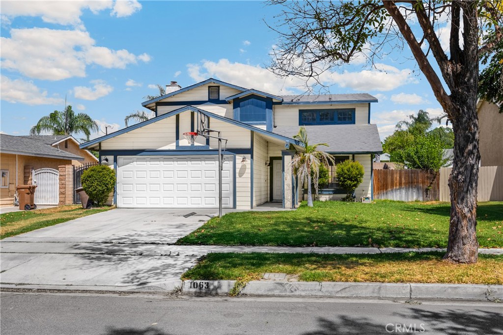 Welcome to 1063 W Long Beach Drive in beautiful Colton, CA!
This charming 3 bedroom, 3 bath home offers wonderful curb appeal, a spacious two-car garage, and is nestled in a desirable neighborhood.
Step inside to a bright, two-story living room that flows seamlessly into the dining area. The interior has been freshly painted, and modern flooring runs throughout for a clean, updated look. The dining room opens directly to the kitchen, which boasts ample cabinetry, granite countertops, and plenty of space for cooking and entertaining.
The inviting family room features crown molding and double sliding doors that open to the backyard. Downstairs also includes a convenient half bath and a laundry room with natural light.
Perfect for gatherings, the backyard offers a large concrete patio, oversized yard, and added privacy.
Upstairs, a wooden staircase with modern metal balusters leads you to three bedrooms, each with ceiling fans and stylish flooring. The primary suite includes mirrored closet doors, a spacious en-suite bathroom, and a separate vanity area. Additional bathrooms feature tile flooring and tub/shower combinations.
With central HVAC throughout, this home is comfortable year-round. Meticulously maintained and move-in ready, it’s the perfect place to call home for years to come!