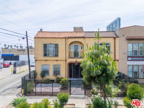 Photo of 1014 W 57th Street, Los Angeles, CA 90037 (MLS # 26835457)