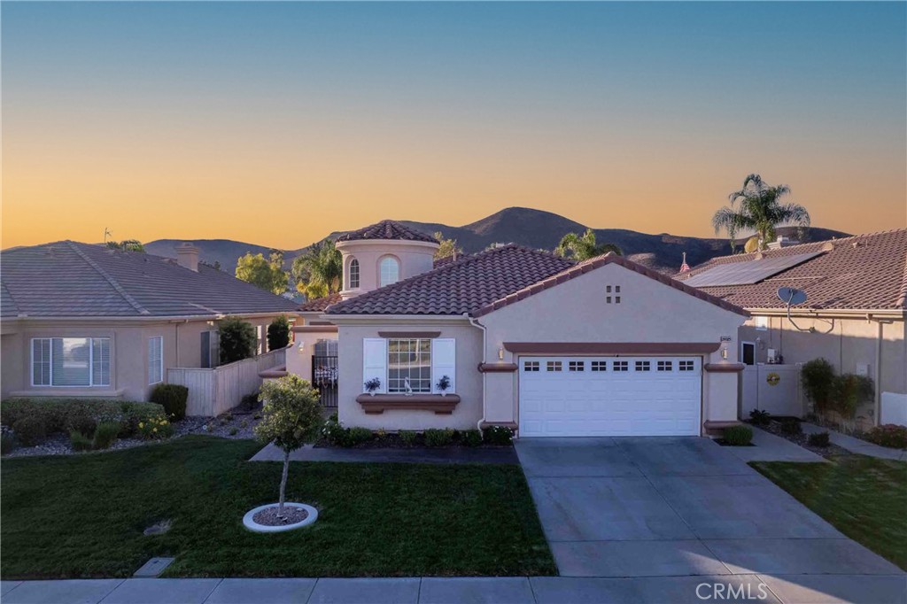 Your Oasis within the Oasis!! Agents, bring your buyers to view this stunning golf course view home in the prestigious 55+ guard-gated community of The Oasis. From the moment you drive through the beautifully manicured entrance, you’ll feel the pride of ownership in every detail—from the lush landscaping to the wide, pristine streets. This spacious 2,457 sq. ft. residence boasts 3 bedrooms, 3 bathrooms, a grand turret-style entry, formal dining room with custom built-ins, living room, family room, and a generous indoor laundry with sink and gas/electric hookups. The open-concept chef’s kitchen is a dream, featuring a professional 5-burner gas range, double ovens, microwave, and a walk-in pantry, seamlessly flowing into the breakfast nook and cozy family room with a fireplace. Step outside to your private backyard retreat, overlooking the 14th hole green. Entertain year-round on the PebbleTec patio with ceiling fans, retractable shade screens, and captivating golf course views. The primary suite offers custom designer closet cabinetry, and every bedroom is enhanced with ceiling fans for comfort. The garage includes an additional parking bay for your golf cart, making it easy to enjoy the community’s championship course. The impressive clubhouse offers an array of amenities to embrace your active and social lifestyle, including sparkling pools, billiards, a fitness center, and more. Don’t miss this rare opportunity to own in one of the area’s most sought-after active adult communities! Call and schedule your private showing today before it’s gone!