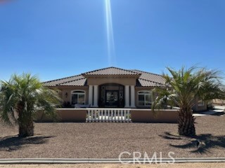 Stunning custom home featuring 3 bedrooms, 2.5 baths, a beautiful open floor plan with 10-foot ceilings throughout. Enjoy breathtaking views from the backyard and relax in the spacious living area with a cozy gas fireplace and Venetian-finish ceiling detail with crown molding. The main bedroom suite offers a luxurious bathroom with dual shower heads in the shower and 2 walk-in closets. This home has an alarm system and 2 water heaters.
The well-appointed kitchen includes a center island, granite countertops, walk-in pantry, and ample cabinet space — perfect for gatherings and everyday living.
Step outside to enjoy the fully fenced backyard with gorgeous views, perfect for entertaining or relaxing. This property includes a finished 3-car attached garage plus a detached 3-car garage (approx. 950 sq. ft.) — fully finished with 220 power and an automatic garage door opener, ideal for a workshop, storage, or recreational space.
Additional features include:
Indoor laundry room, Granite countertops and natural stone & tile floors, Front yard landscaping with extensive concrete work, Ceiling fans throughout, Evaporative cooler plus refrigerated A/C, Shared bathroom between secondary bedrooms.
Pride of ownership is evident in this beautifully maintained home. This is a must see property. Call for an appointment today!!!