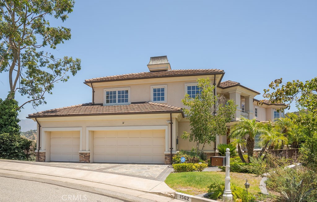 Welcome to your private sanctuary in the hills! Situated in the highly desirable Chevy Chase Country Club community of Glendale, this almost 4,000 sq ft, custom-built 4 bedroom (plus an office that can be used as a 5th bedroom), 3.5 bathroom home is hitting the market for rent for the first time since being built in 2005. Walking in from the main entrance, you are greeted by a small foyer space and beautiful wooden flooring throughout the main level and a large powder room right off the entrance. Walking down you'll find a large Formal Living Room with 14 ft cathedral tray ceilings, fireplace and direct access to a private outdoor patio space with sprawling views of the Chevy Chase Community Hills. As you walk further down you arrive at a large private dining room and a gourmet kitchen with updated custom appliances, large center island and convenient breakfast nook. Directly across from the kitchen is a large formal Family Room featuring astoundingly high tray ceilings, large custom bar, fireplace and another direct access to a private outdoor patio. Moving down the hall you arrive at a large bedroom with a custom upgraded full bath off the hall. As you move to the second level of the home you will arrive at two oversized guest bedrooms with generous walk in closets and shared fully updated Jack and Jill full bathroom. At the furthest corner of the home, you arrive at the grand master bedroom featuring its' own private patio, a huge walk in closet with custom cabinetry, and a luxury spa-inspired master bathroom with large soaking tub, oversized walk in shower and premium custom finishes. This beautiful home has too many updates to mention with some notables being: Beautifully landscaped backyard with jacuzzi tub, custom lattice and patio with premium bbq grill and refrigerator. Sweeping views from every direction of the home. Electric window coverings for almost every window covering, Private storage access from backyard, custom 3 car garage with epoxy floors and air pressure outlets, upgraded carpeting and premium finishes throughout, just to name a few.