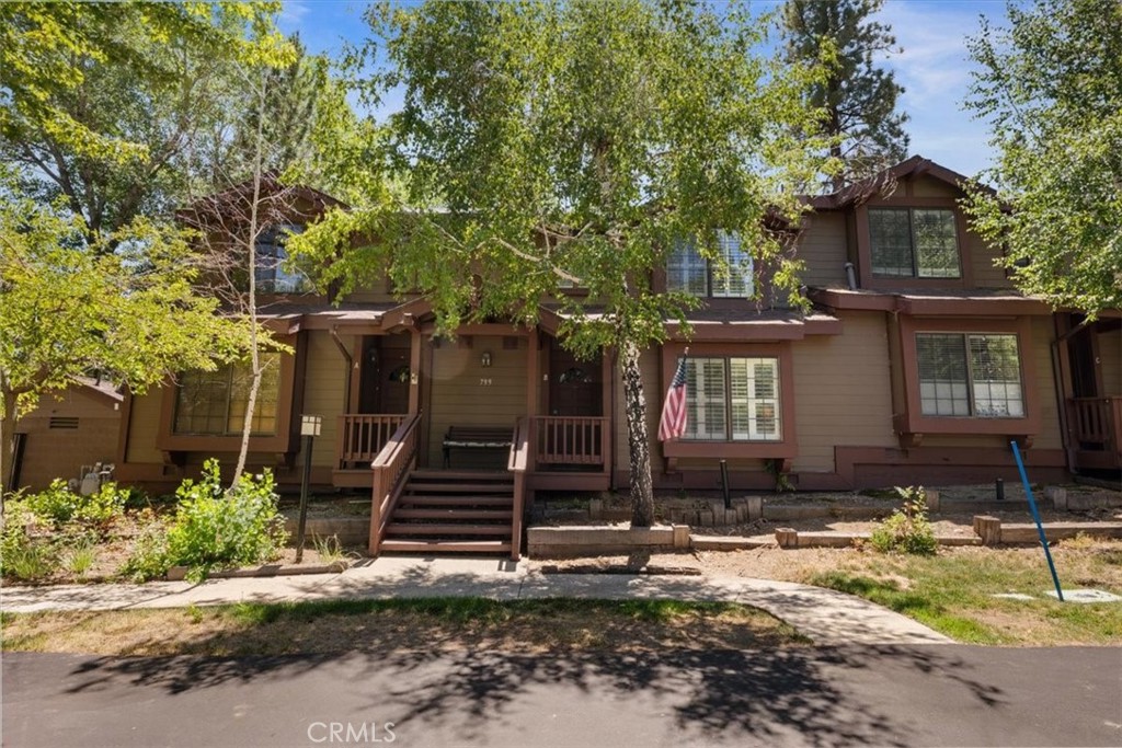 Upgraded Bayshore Ski and Racquet Club condominium in Big Bear Lake. This property features custom wood features including plantation shutters, crown molding, custom built closets, large baseboards throughout, and wainscoting.The condo is in move-in ready condition with updated flooring including wood look ceramic tile and Shaw premium carpet. The open floor plan includes one bedroom and bathroom downstairs, with two bedrooms upstairs (including a spacious master) with vaulted ceilings.The property has newer plumbing and lighting fixtures, as well as new hickory cabinets with chiseled edge granite in the bathrooms. Updated electrical outlets and switches throughout with wall sconces add to the attention to detail in this home. The complex offers two tennis courts, two pools, two spas, and a day use dock. Association dues cover snow removal, landscaping, and most exterior maintenance.Enjoy the convenience of Boulder Bay Park, Pleasure Point Marina, and the many hiking and biking trails in the area. Don't miss out on this super clean condo!