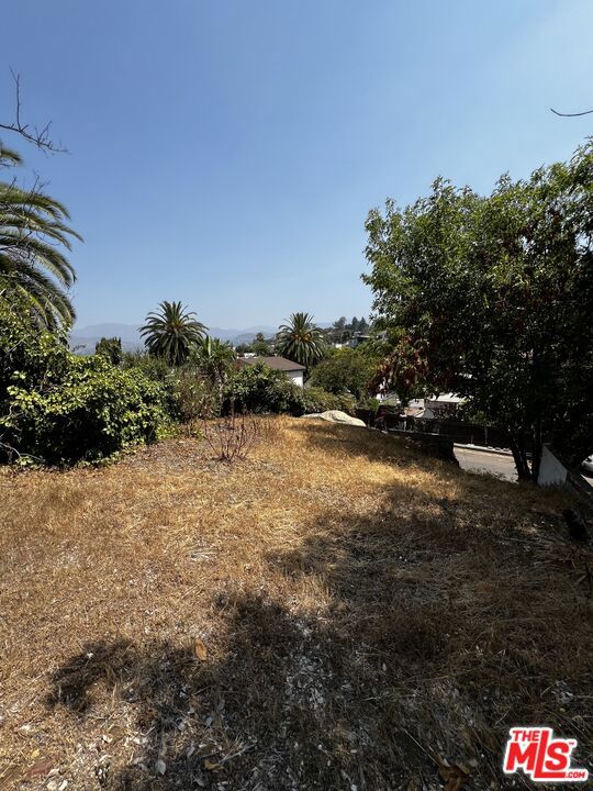 Nestled in the tranquil enclave of the coveted Adams Hills neighborhood. This improved Prime Residential Hillside Lot offers the laid-back charm of an idyllic small town within a cultural epicenter. Rare opportunity to build your View Home with incredible appreciation potential. Set atop the apex of Wellesley Drive, this lot provides the best view of the area hillside homes and the mountains. The location is excellent... you'll discover everything you love is conveniently close to home! With easy access to world-class shopping, wonderful upscale dining and charming cafes, plus exciting recreation and entertainment... minutes to the Greek Theatre, Griffith Park, the Observatory, Hollywood Sign, Universal Studios, the Disney Campus, and the nearby Atwater Village, Los Feliz, Glendale, Pasadena, Hollywood and Downtown L.A.
