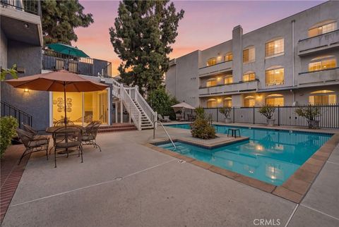 Photo of 17711 Margate Street #103, Encino, CA 91316 (MLS # SR26068907)