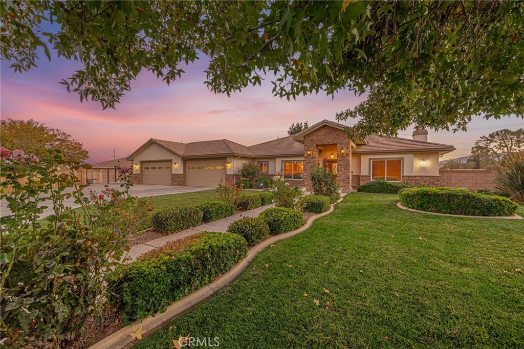 Five Star Resort Living! Tennis before breakfast and a swim after work -are just two of the exciting amenities found in this gorgeous property! Desert Rose Custom home w/ everything you can dream of! Elegant 5 bedroom, 4 bath single story home on 1 Acre +/- lot. Energy Efficient owned Solar system. This exclusive home offers a spacious floorplan with a soothing feel. Wide hallways, expansive rooms, custom upgrades everywhere you look. Large formal living rm, formal dining rm, open family rm. Excellent kitchen with center island and roomy pantry area. Double oven, 5 burner cooktop, large stainless steel refrigerator and all the amenities a home chef needs. The bedroom wing offers 4 sizable bedrooms, 2 full bathrooms plus the enormous double door entry master bedroom suite and tranquil master bathroom with jacuzzi tub. Large walk in organized closet and private door to the wonderful patio area. Moving on to the other exciting features of this home - The attached 4+ car super sized and insulated garage is truly a showplace. Epoxy floors, space saving cabinets & shelves and excellent lighting. You won't believe how much space this garage offers. Plenty of paved driveway and RV parking area, Top of the line fully lighted tennis court plus a full size pickleball court. In-ground pebbletech pool with auto cover and lounge deck and luxurious spa. Detached Pool house with outdoor shower. Horseshoe pits. First class covered patio with the ultimate grillmasters entertainment area. The outdoor kitchen includes a smoker, BBQ, refrigerator, 2 burners, built-in sound system, mounted TV, ceiling fans and granite countertop bar that seats 8. Crowd pleasing Wood burning pizza oven imported from Italy with cultured rock exterior and copper roof. Plenty of room to relax and enjoy! Last but not least -the approx 1100sf detached guest house, 2 bed/2 bth, w/living rm & kitchen with oversized 2 c. gar and extra storage(originally permitted as garage and workshop). The list goes on & on!