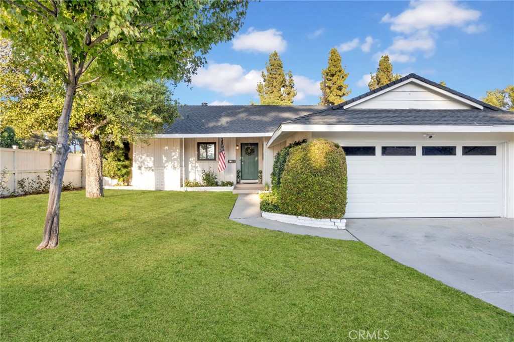 Welcome to this beautifully remodeled home located in the highly sought-after community of Northridge. Thoughtfully designed and custom-built, with 1700 sq ft of living space, this residence offers 4 bedrooms and 3 bathrooms. Step inside the spacious open floor plan, the cook's kitchen features stunning custom cabinetry, Quartz countertops, elegant brass accents, a wine rack and wine refrigerator. Sit at the kitchen counter/bar or in the separate dining room. The kitchen opens up to the living area, complete with a decorative fireplace and a view of the backyard. French doors open to a covered patio—ideal for indoor/outdoor entertaining and relaxation.
The remodeled bathrooms showcase stylish new tilework, vanities, and fixtures throughout. Situated on a generous 7,000+ sq ft lot, the property also includes energy-efficient dual pane windows, a newish roof, and a full 2-car garage with epoxy flooring. Conveniently located within walking distance to CSUN, popular restaurants, grocery stores, Costco, Northridge Mall, and other retail shops.