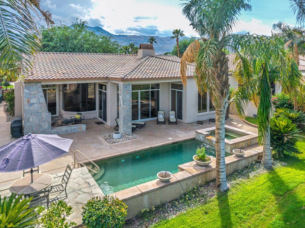 Welcome to the world-famous Jack Nicklaus Tournament Course at PGA West, where this impressive 4 bedroom, 4 bathroom, 3300+ sq ft home sits just off the 18th tee box with amazing views looking down the fairway at the Santa Rosa Mountains to the west. Designed for both comfort and entertaining, the home showcases a spectacular backyard oasis with multiple seating areas, a custom tile-accented outdoor fireplace, and ample space to host friends and family.Inside, the open-concept layout is anchored by a gourmet kitchen featuring granite counters, a large center island, high-end appliances and dual patio doors that open to a front courtyard. The main living area flows seamlessly into the dining room and spacious living room with floor-to-ceiling windows and a built-in fireplace, all enjoying beautiful backyard views. A sunken bar completes the perfect entertainer's space. The primary suite is its own retreat, offering a private sitting area, spa-like bathroom with full tile walk in shower, sunken soaking tub, dual vanity and walk in closet.For guests, the property features exceptional privacy with two detached suites. One offers a large en suite guest casita while the second includes a unique two -bedroom setup ideal for extended family or visitors. Just a short stroll away, the public clubhouse at PGA West offers and upper level patio overlooking the 9th and 18th greens of the Nicklaus Course, a lively restaurant and bar, and the perfect spot to catch your favorite game. Beyond PGA West, enjoy nearby world-class polo grounds, the iconic Coachella and Stagecoach music festivals, and the charm of Old Town La Quinta with its boutique shopping, dining and weekly farmer's market.This home combines the prestige of a PGA West address with the ultimate in desert lifestyle living- an opportunity not to be missed. Now available for September and October 2025! Please note that high-season rates apply outside of these dates.