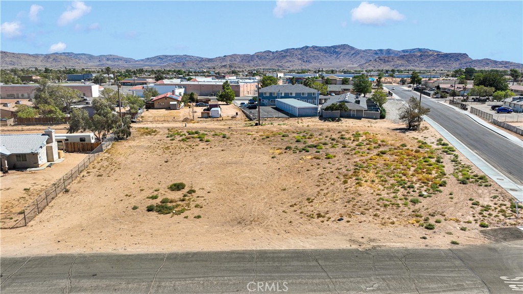 This lot has unlimited possibilities. Just shy of a full acre of almost all flat, usable, R3 land in a GREAT location of Apple Valley! Close to schools, shops and services as well as close proximity to some of Apple Valley's best restaurants! This multi-family lot sits on the corner of Yakima Rd and Powhatan Rd - potentially letting you build the front of your unit(s) on either street. The Town of Apple Valley recently finished a nice sidewalk on one side of the lot. Take a look today - you won't be disappointed. Buyer to verify with town of Apple Valley the information regarding utilities, permits, sewer, water, zoning, lot size etc. Seller or seller's agent does not guarantee the accuracy of the public record, or any information provided by the MLS. Buyer and buyer's agent to verify all.