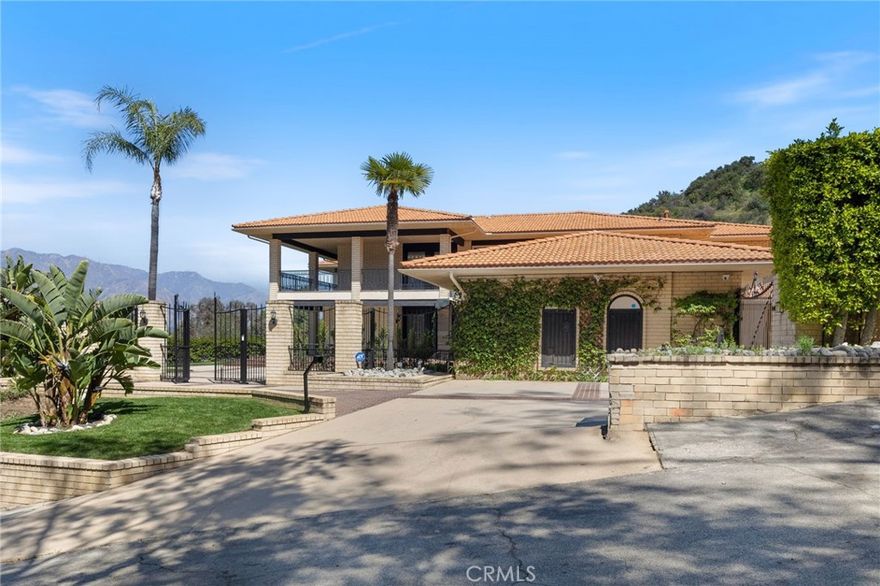 Tucked away at the end of a quiet cul-de-sac, this gated La Canada Flintridge estate captures the essence of California Living-where open space, mountain views, and comfort come together effortlessly. Backed by untouched natural surroundings, the home offers exceptional privacy, sweeping vistas of the San Gabriel Mountains, and resort-style amenities framed by beautifully landscaped grounds. 



Inside, natural light fills every corner, accentuating the home's spacious design and panoramic views. The main level is designed for both entertaining and everyday convenience, featuring a gourmet kitchen with a new Sub-Zero refrigerator and brand-new double oven and dishwasher. Formal living and dining rooms offer elegant settings for gatherings, while a stylish bar and lounge create an inviting space to unwind. Two guest bedrooms and two-and-a-half baths complete the first floor, providing convenient flexibility for family and guests. 



The upper level reveals a grand primary suite that serves as a true retreat, expansive in size, with oversized closets and a luxurious spa-inspired bath. From the bedroom, panoramic mountain views provide a breathtaking backdrop. A dedicated study room near the primary suite offers an ideal space for work or a library, while the wraparound balcony invites you to take in unobstructed views of the San Gabriel Mountains from sunrise to sunset. Four additional bedrooms and three well-appointed bathrooms complete the upstairs layout, offering space, comfort, and versatility. 



Outdoors, the property transforms into a private retreat. A newly renovated pool and spa anchor the lush backyard, surrounded by mature trees and manicured hedges. A built-in barbecue pavilion sets the stage for effortless entertaining, while a versatile enclosed area offers endless possibilities - a home gym, outdoor office, or playroom. A four-car garage with freshly epoxied floors and a dedicated storage room. 



Just minutes from award-winning La Canada schools, Flint Canyon Tennis Club, NASA/JPL, and a short drive to Huntington Memorial Hospital and Kaiser Permanente.



Offered for long-term lease. Contact us today to schedule a private tour.