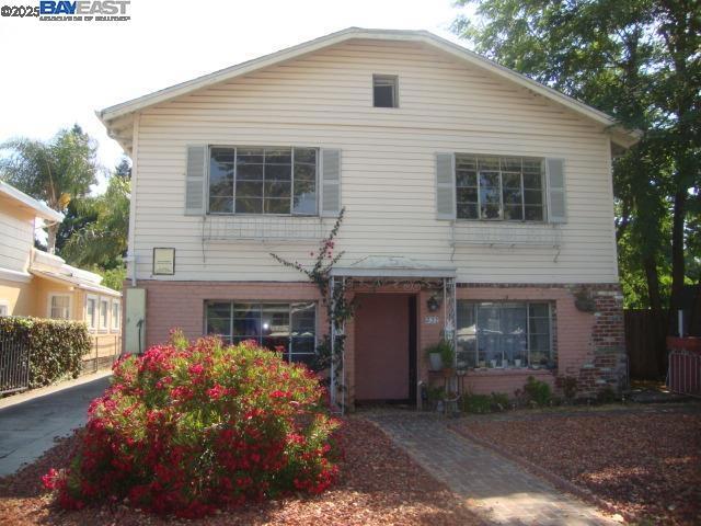 **Contractor or Builder Special**Tri- Plex with large 8,900 sf lot in the rear. 2Br unit upstairs and Two 1 Br unit on the bottom, (2,878 sq ft interior). Possible to add two or three more units on the rear portion of the lot. Lot is 50 X 265 or 13,304 (1/3acre)