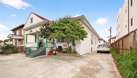 Photo of 1324 Magnolia Avenue, Los Angeles, CA 90006 (MLS # SB26037039)