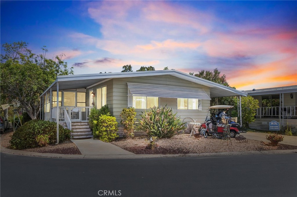 Welcome to your next chapter of easy living—just minutes from the breathtaking Carlsbad coastline. This beautifully maintained 433A-certified manufactured home wont last long, it offers the perfect blend of comfort, convenience, and coastal charm—all nestled within one of North County’s most sought-after 55+ communities. Complete with a wheelchair accessible lift and walk in tub. Step inside to discover a bright and airy open-concept layout with plenty of natural light, updated finishes, and a seamless indoor-outdoor flow—perfect for entertaining or relaxing in style. Enjoy resort-style amenities including a sparkling pool & spa, clubhouse, fitness center, shuffle board, golf course, ballroom and vibrant social calendar. The community is beautifully landscaped and ideally located near scenic walking trails, local shopping, dining, and, of course, the beach!