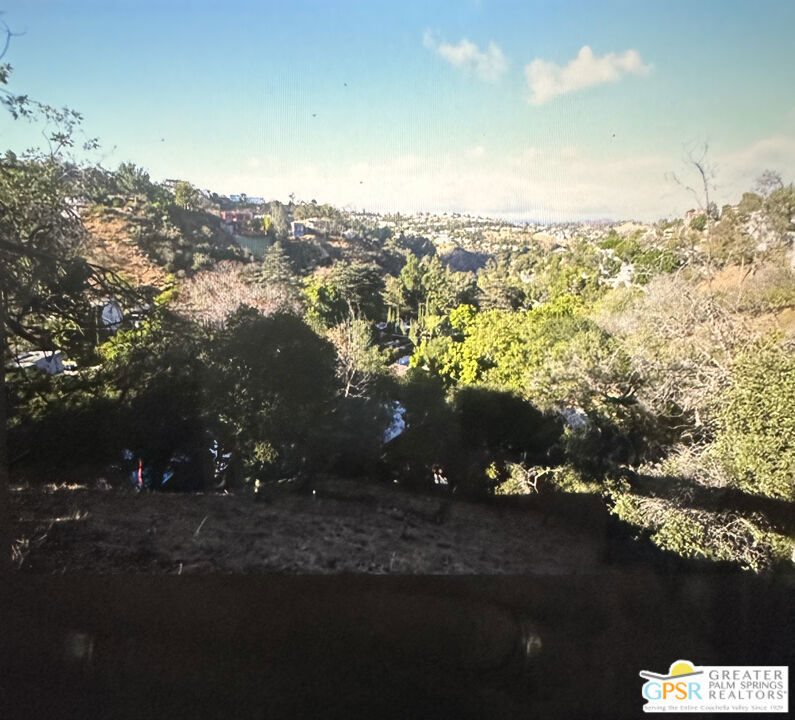 Desirable Laurel Canyon downslope lot with amazing views. Top of the hill, easy access off Kirkwood. Some lot frontage on the street at the rear lot property line...Yucca Lane. Opportunity to acquire the other two contiguous lots, and build a larger home. Buy to rely on their own investigations to determine actual lot lines. 5556-017-028, 5556-017-029. 5556-017-030.