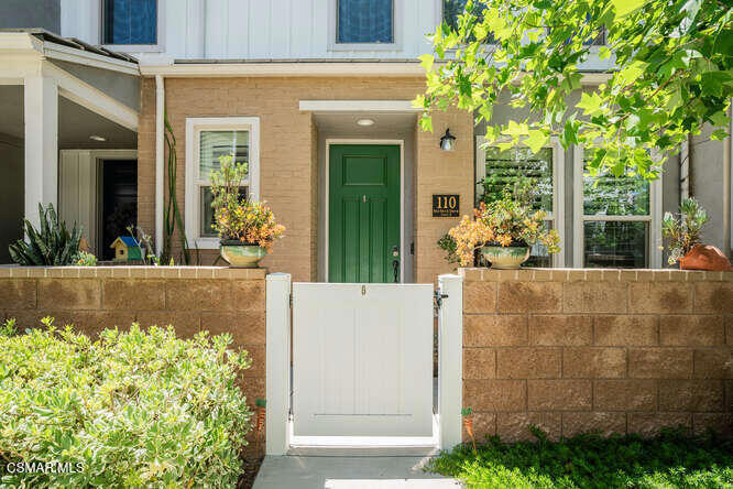 Welcome to this beautifully upgraded 3-bedroom, 2.5-bath townhome located in the highly sought-after Westerly community of Simi Valley. Offering a perfect blend of comfort, style, and functionality, this modern home is ideal for those seeking low-maintenance living with resort-style amenities. Step inside to discover an inviting open-concept floor plan featuring wood-like flooring, soaring ceilings, recessed lighting, and plantation shutters throughout the main level. The spacious living and dining areas seamlessly flow into a gourmet kitchen, designed with the home chef in mind. Highlights include quartz countertops, crisp white cabinetry, stainless steel appliances, a large center island with bar seating, custom tile backsplash, pendant lighting, and a generous walk-in pantry. Upstairs, the primary suite serves as a peaceful retreat with dual vanities, quartz counters, and a beautifully tiled walk-in shower. Two additional bedrooms offer flexibility for family, guests, or a home office, and are served by a tastefully upgraded full bathroom with dual sinks and a tiled tub/shower combo. Additional features include a solar energy system, two-car attached garage with built-in storage, and extra driveway parking. Enjoy your own private patio space, perfect for morning coffee or outdoor dining. As a resident of the Westerly community, you'll have access to amenities including a resort-style pool, spa, dog park, and playground. Conveniently located near schools, shopping, dining, parks, and freeway access. Don't miss the opportunity to lease this turnkey home in one of Simi Valley's most desirable neighborhoods!
