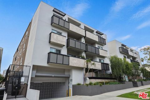 Photo of 1439 N Poinsettia Place #304, Los Angeles, CA 90046 (MLS # 26650677)