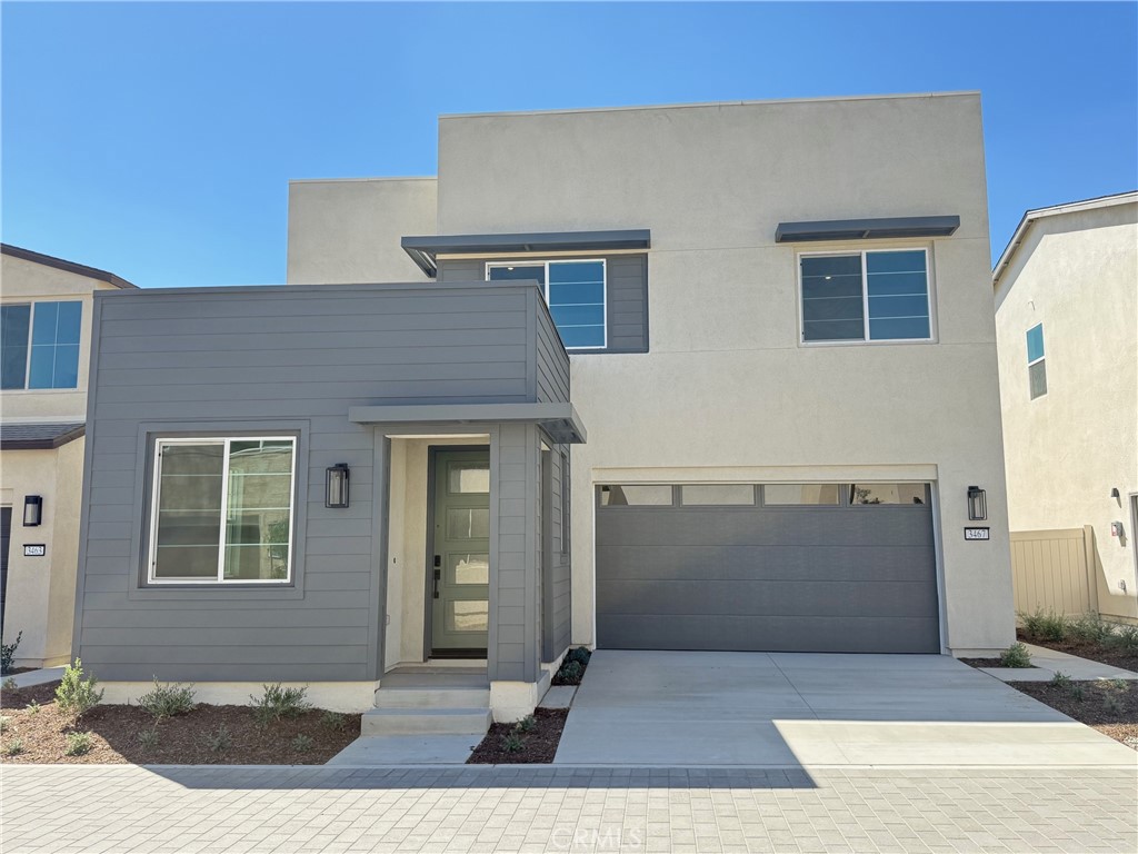 This beautiful 2-story home features a California Modern exterior style. The Peri Plan 1 floorplan includes 3 bedrooms, a den/office, loft and 2- Car Garage. The downstairs powder room has been upgraded to be a full 3rd bath. This home includes beautiful upgraded features such as a quartz countertops with full splash in the kitchen, sink in the laundry room, single basin stainless steel sink and electrical package. You will also enjoy a Samsung 30” smart freestanding induction range, Samsung over-the-range microwave and Samsung dishwasher in stainless steel all included. Upgraded luxury vinyl plank flooring on the main floor, tile in the bathrooms and laundry and the remainder in carpet finish off this stunning home! The community offers a contemporary amenity space with a pool, jacuzzi, dog park, barbeques, fire pits and playground. Peri plan 1 is waiting for you! Home ready for move-in.