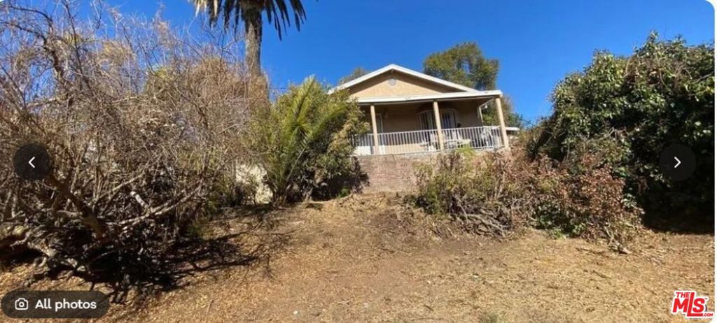 Cute starter home , close to downtown , the house is a walk up and set back from street on top of hill , no garage only street parking, 2nd bedroom was converted to den/ office.