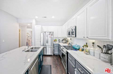 Photo of 26828 Willow Creek Lane #23, Valencia, CA 91355 (MLS # 26642623)