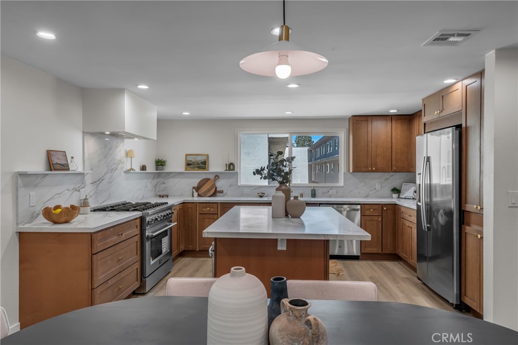 Step into coastal elegance with this breathtaking 2-bedroom, 2.5-bathroom split-level townhome, reimagined by a visionary designer in the heart of Marina Del Rey! Every inch of this chic residence radiates sophistication, from the innovative open-concept layout to the dazzling designer kitchen—a culinary haven boasting gleaming quartz countertops, bespoke cabinetry, and a show-stopping 36” range that’ll ignite your inner chef.
Both oversized bedrooms are serene retreats, each with luxurious en-suite bathrooms upgraded with sleek modern fixtures and stunning tilework, offering spa-like indulgence. Stay cool with a brand-new AC unit, simplify chores with a central vacuum system, and enjoy the ease of a spacious 2-car garage for parking and storage.
Nestled in a prime, ultra-walkable location, you’re mere steps from Marina Del Rey’s lively waterfront, trendy eateries, and boutique shops. This is more than a home—it’s a lifestyle. Seize the chance to own this coastal masterpiece; schedule your private tour now and fall in love!