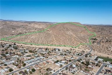 Photo of 1 Avalon Avenue, Yucca Valley, CA 92284 (MLS # JT25172497) Photo of 1 Avalon Avenue, Yucca Valley, CA 92284 (MLS # JT25172497)