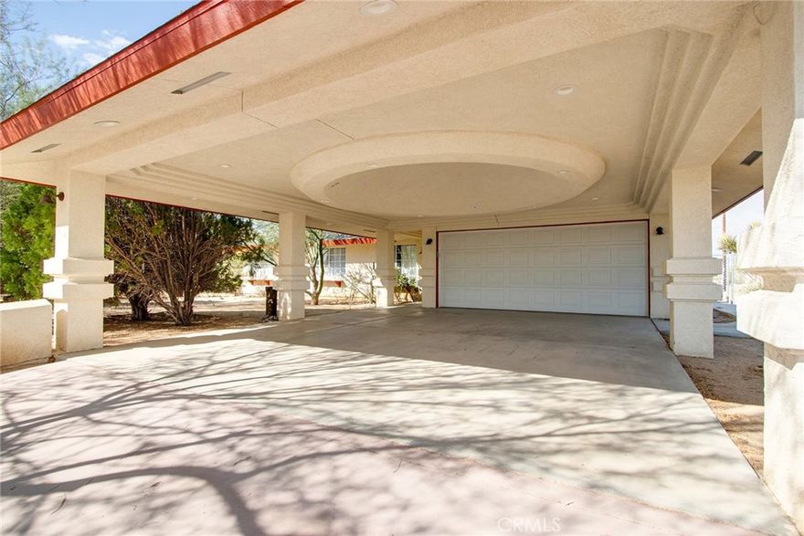 Premier 3 Bedroom 2 Bathroom Home With 1,616 Sqft On 1.25 Acres In One Of The Most Sought After Locations Of The Hi-Desert! Welcome to your private desert retreat, an architectural gem nestled in a serene cove just minutes from Joshua Tree National Park. This stunning home seamlessly blends organic design with modern comfort, showcasing distinctive dome-inspired architecture, smooth craftsman cement finishes, and breathtaking panoramic views of the desert and mountains from every angle.

Step inside to discover a light-filled layout designed for relaxation and connection. The property is family and dog friendly, featuring a fully fenced backyard that provides a safe space for kids and pets to play under the desert sun. The expansive front yard, framed by elegant Palos Verde trees and native desert landscaping, leads down a long private driveway, creating a true sense of arrival and tranquility.

In the backyard, a separate casita awaits, offering the perfect space for guests, creative projects, or a yoga studio for wellness retreats. This home also includes a brand new septic system and thoughtfully maintained utilities, ensuring comfort, reliability, and low-maintenance desert living.

Located in a peaceful neighborhood, this sanctuary is just a few minutes' drive from the entrance to Joshua Tree National Park, as well as local dining options and the vibrant town center of Joshua Tree, while still feeling a world away. Experience the perfect blend of nature and modern living in this unique desert oasis.