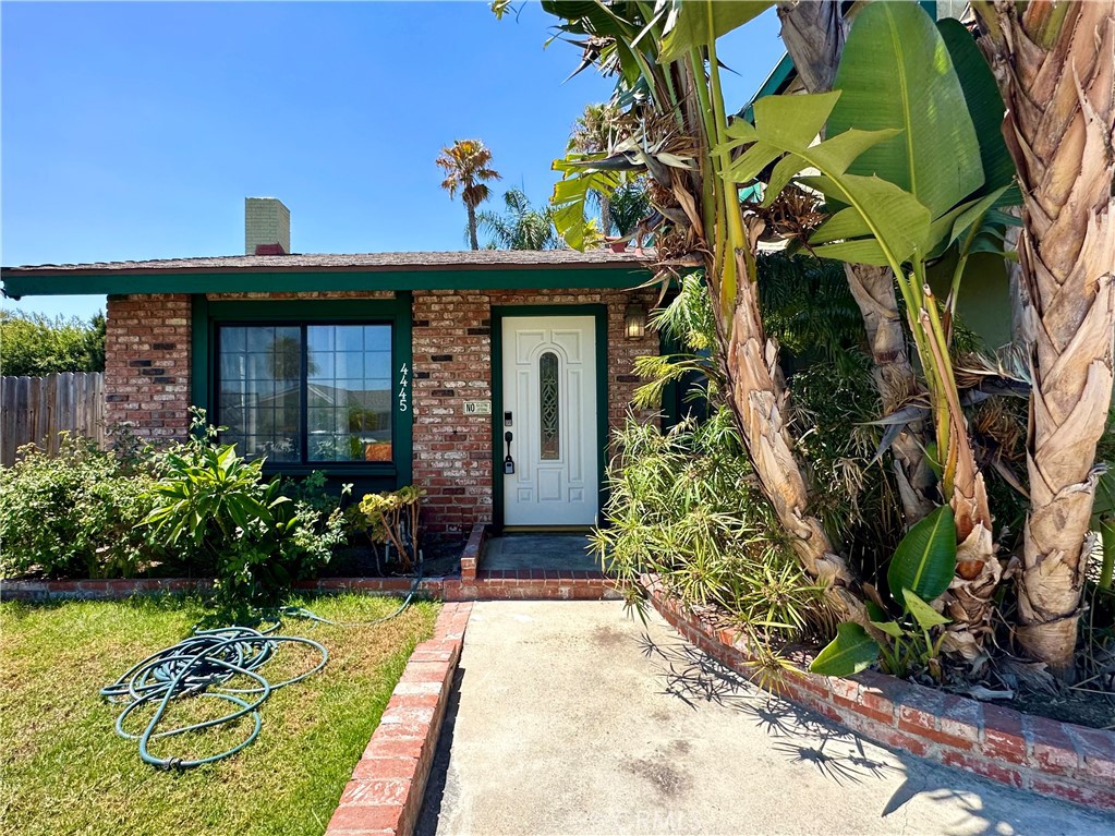 This beautifully updated Yorba Linda home features brand new wood flooring on the first floor and fresh interior and exterior paint. Offering 4 spacious bedrooms and 4 full bathrooms, the layout includes a private upstairs suite with its own living room, wet bar, full bath, and corner office overlooking the pool—ideal for guests, extended family, or a private retreat. A convenient downstairs master suite adds flexibility for multi-generational living. Outside, the tropical-style backyard boasts a sparkling pebble tech pool, private sitting area, and a spacious side yard currently used as a dog run. Nestled on a quiet cul-de-sac and within walking distance to Yorba Linda High School, this home offers comfort, versatility, and an exceptional location.
