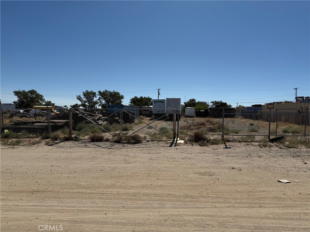 Undeveloped land .28 Acres in Lancaster next to Sierra Highway and Valley Line Rd. Ideal for contractor storage yard or workshop. Purchaser to verify zoning and land use.