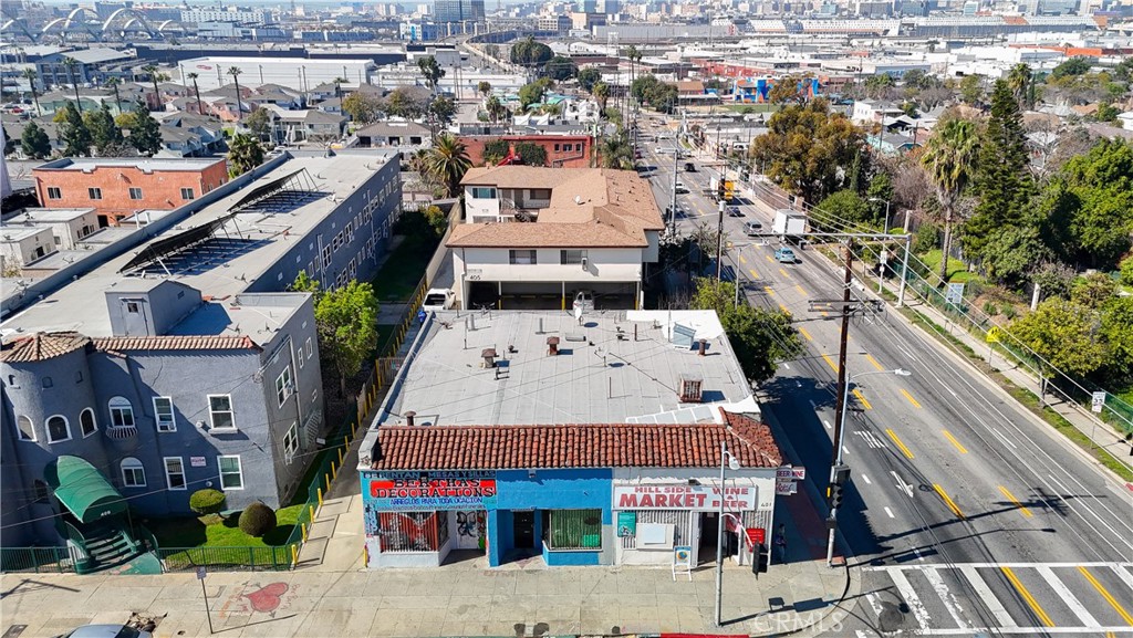 The subject is a "mixed use" income property comprised of a 16 unit multi-family apartment building (built in 1961) and a separate 3 unit retail building. The property is located at the corner of a signalized intersection (Boyle and East 4th St) in the heart of Boyle Heights and adjacent to Downtown L.A. The two buildings sit on a large C2 lot located in the East Los Angeles Enterprise Zone with an Overlay Mixed Use Neighborhood Community Plan. Several of the units enjoy an incredible view of Downtown L.A. and 6th Street Bridge. Most of the units are singles, one unit is 1 bed/1 bath, and one unit is a 3 bed/2 bath. The property has been owned by the same family that built the residential units and have maintained it well with several upgrades. The property has been Earthquake Retrofitted back in June 2023. *Seller carryback financing is an option*