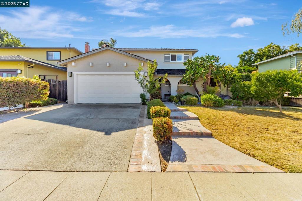 Welcome to this beautifully updated home nestled in one of Santa Clara’s most desirable neighborhoods. Bursting with natural light and modern charm, this residence offers the perfect balance of comfort and style, right in the heart of Silicon Valley. A spacious open-concept layout with 4 bedrooms, elegant hardwood and stone flooring, and fresh interior paint throughout—including refinished cabinetry in the kitchen and bathrooms. The thoughtfully updated bathrooms and kitchen add both beauty and functionality, while dual-pane windows, copper plumbing, central A/C, and a forced-air furnace ensure comfort and efficiency year-round. Designed for effortless indoor-outdoor living, the backyard is a true entertainer’s dream. Enjoy a large covered deck, a fully equipped outdoor kitchen, and beautifully landscaped grounds adorned with vibrant flowers and mature fruit trees. A detached full bathroom with walk-in shower, sink, and toilet for guests or outdoor gatherings. And when it’s time to unwind, the oversized primary suite provides a peaceful, spa-like retreat you’ll love coming home to. Located just one mile from the new Apple Campus, steps from Santa Clara High School, and moments from top-rated schools, shopping, dining, and freeway access. Come experience it for yourself!