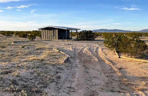 Photo of 81374 El Paseo Dr, 29 Palms, CA 92277 (MLS # JT26041049)