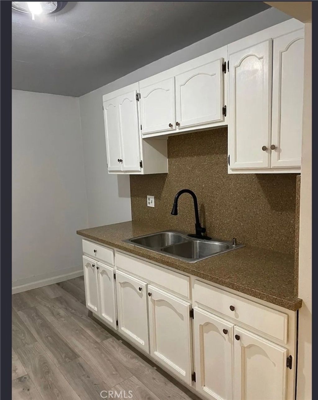 Photo of 6152 Wilcox Ave, Maywood, CA 90270 (MLS # SW25261270)