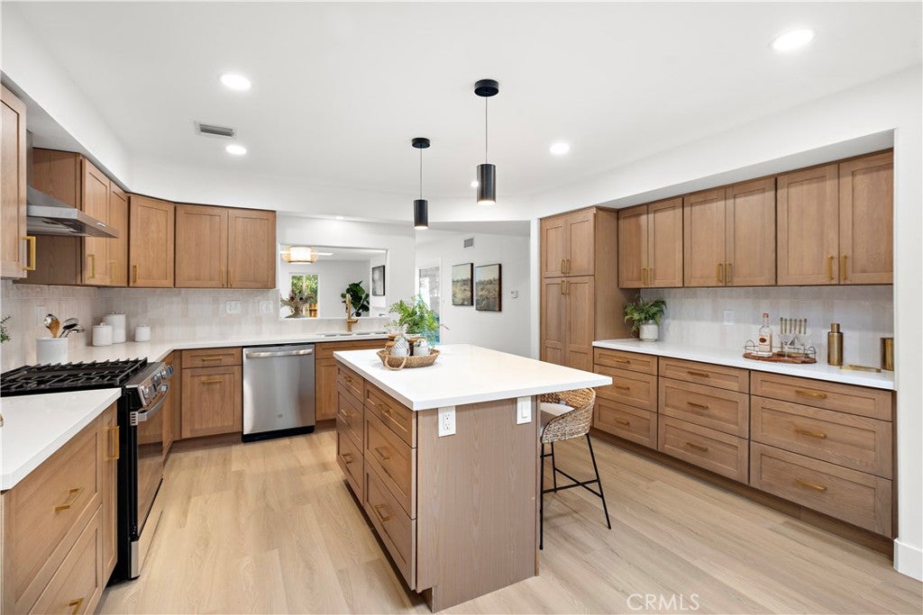Photo of 22323 Miranda Street, Woodland Hills, CA 91367 (MLS # OC26155791)
