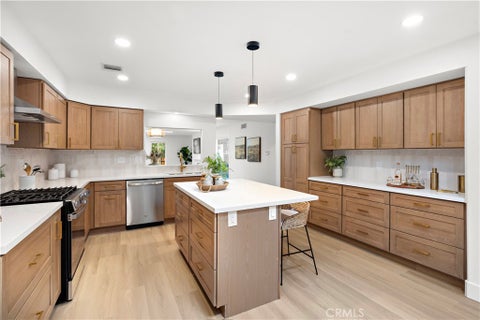 Photo of 22323 Miranda Street, Woodland Hills, CA 91367 (MLS # OC26155791)