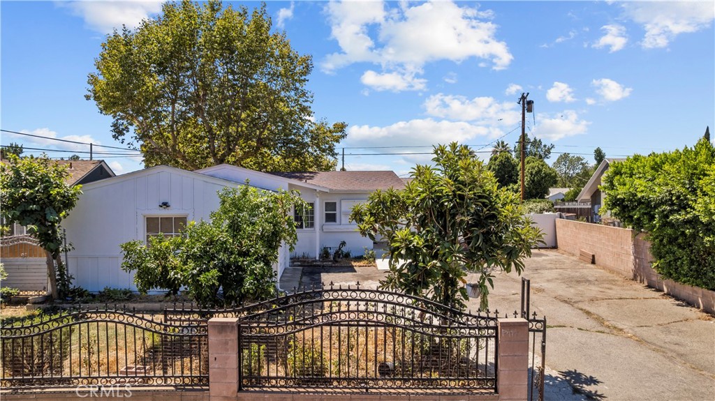 Welcome to 8053 Brimfield Ave, a single-story home nestled in the heart of Panorama City. Incredible opportunity for investors or family looking a place to call their own. This original 3 bedroom + 1.5 bath home also includes a large 4th bedroom addition (unpermitted from previous owner) adding approx 216 add'l sq ft. at the opposite side of the home that provides a multi-generational option or room-for-rent with its own separate entrance and sliding door to side yard. 2-car garage and a spacious 6,367 sq ft lot - perfect for expansion or renovation. Additional highlights include a large living room w/recessed lights and slider to backyard, dining area, spacious kitchen with granite countertops, stainless steel gas range/oven and indoor laundry room with sink and added cabinets for additional storage. Dual-paned windows installed 2018/2019 and sliding windows in 2020. The generous sized front yard is gated and can accommodate at least 3-4 cars. Conveniently located near Panorama Mall, Mission Community Hospital, Kaiser Permanente/Valley Presbyterian Hospitals, schools (Michelle Obama Elem, Vista Middle, Panorama HS), shopping, dining, public transportation, Flyaway Bus Terminal and easy access to the 405 and 101 freeways. Sold AS-IS.