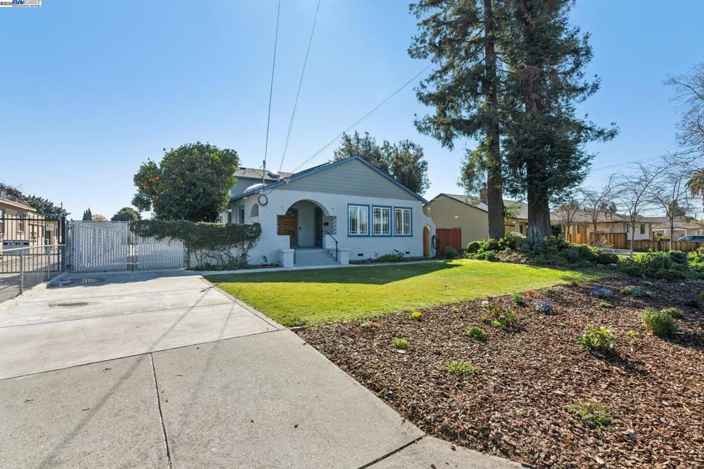 Charming Home with Incredible Potential! Don’t miss this rare opportunity in Hayward's desirable Cherryland neighborhood! This single-family home sits on approximately half an acre, offering endless possibilities. With the potential for multiple ADUs or even subdividing the lot, this property is perfect for investors or homeowners looking to expand. The home features 2 cozy bedrooms and a primary bedroom downstairs and a spacious primary suite upstairs, complete with its own private balcony—perfect for relaxing. The generous lot size provides ample space for expansion or development. Whether you're looking to renovate, build, or create income-generating units, this property offers the flexibility to make your vision come to life. Act quickly, this opportunity won't last long!