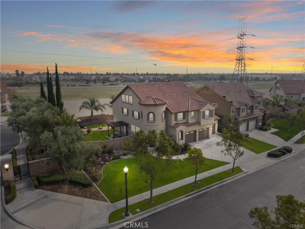 Welcome to 5381 Campania Way! This inviting home features 5 bedrooms & 3 bathrooms, offering comfortable living space. The kitchen is equipped with modern appliances, island & connection to the family room for entertainment. Located in a planned community, residents have access to nearby community pool, playgrounds for the young ones along with a fitness center, shopping just a few blocks away, water park, hockey, public community center and schools. Enjoy the community features that enhance your lifestyle. This home is a great opportunity for anyone looking to settle in a vibrant area.