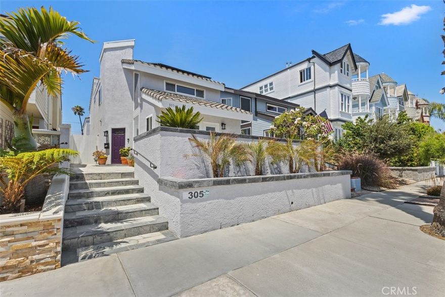 Welcome to 305 21st Street, an exquisite residence in the heart of Huntington Beach, just a block away from the famed Huntington Beach. This brand new remodeled haven offers three spacious bedrooms and two and a half bathrooms within a sprawling 2,400 square feet with 2 living rooms. Step inside to discover a newly remodeled kitchen and bathrooms, showcasing contemporary finishes that blend style with functionality. The open-concept layout is adorned with new floors throughout, creating a seamless flow from the living spaces to the private back patio, perfect for intimate gatherings or tranquil moments. The home features high ceilings architecture and skylights, inviting an abundance of natural light to illuminate the interiors and a NEW roof. Enjoy the luxury of air conditioning and a convenient washer/dryer upstairs! The detached garage provides ample parking and storage space. Outside, the front patio offers an ocean view, while the back yard serves as a peaceful retreat. Positioned in a coveted location near the beach, this home embodies coastal elegance and modern comfort. Don't miss out on this!