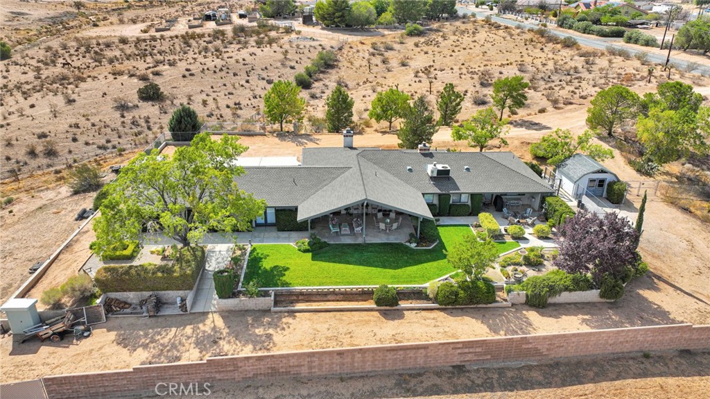 Welcome home to this beautifully maintained 3 bedroom, 2.5 bathroom residence offering over 2,600 sq. ft. of living space on a sprawling 3.56-acre lot. Perfectly designed for comfort and function, this property combines country charm with modern living.
Step inside to find a spacious floor plan with a bright, open living area that takes in breathtaking 180° views of the mountains and desert. The kitchen and dining areas flow seamlessly into a large bonus room, ideal for a game room, home gym, or additional family room—the options are endless!
Outside, you’ll find lush, mature landscaping, a shed, and a chicken coop, offering a true rural lifestyle while remaining close to town amenities. The property is fully usable and horse-friendly, with plenty of room for corrals, an arena, or additional outbuildings.
Experience peace, privacy, and expansive views—all from your own backyard. This is the desert lifestyle at its finest!