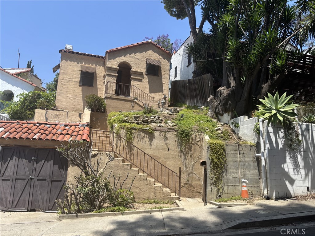 Welcome to 919 Dexter St, a charming and historic property located in the heart of Highland Park, CA. Built in 1929, this single family home exudes character and charm with its timeless architecture and unique features. Boasting 2 bathrooms, this home offers a comfortable and convenient living space for you and your loved ones. With a finished area of 1,199 sq.ft., there is plenty of room to spread out and make memories in this lovely abode. Situated on a lot size of 2,775 sq.ft., this property provides a manageable outdoor space for relaxing and entertaining. The lush landscaping and mature trees add to the overall appeal of the home, creating a peaceful and serene environment for you to enjoy. Conveniently located in Highland Park, you are just minutes away from trendy shops, delicious restaurants, and vibrant nightlife. Whether you prefer a quiet evening at home or exploring the bustling city, this home offers the perfect balance of comfort and convenience. Overall, 919 Dexter St is a delightful property that combines historic charm with modern amenities. Don't miss the opportunity to make this house your home and experience the best of Highland Park living.