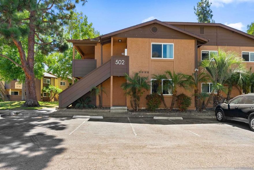 Beautiful opportunity in Oceanside’s Lakeshore Villas! This inviting lower-level 2-bedroom, 1-bath condo offers comfort, convenience, and a peaceful lakeside lifestyle in the heart of San Diego County. Perfectly located next to scenic Libby Lake Park, residents enjoy direct access to walking trails, open green space, and a community playground—an ideal setting for relaxation and recreation.  Step inside to find an open-concept living area that flows seamlessly into the kitchen and dining space. The bright kitchen features plenty of cabinetry, ample counter space, and refrigerator. Sliding glass doors lead to a private patio with tranquil lake views, perfect for morning coffee or evening unwinding. Both bedrooms are generously sized, and the full in-unit laundry closet adds everyday convenience.  The Lakeshore Villas community offers wonderful amenities including a pool, hot tub, and skate park area, designed for outdoor fun and connection. Enjoy your assigned covered parking space along with plenty of guest parking for visitors.  Located just 7 miles from the ocean, this home is close to Oceanside’s beaches, dining, shopping, and major commuter routes. Whether you’re a first-time buyer, downsizing, or investing, this condo combines value, location, and the laid-back Southern California lifestyle.