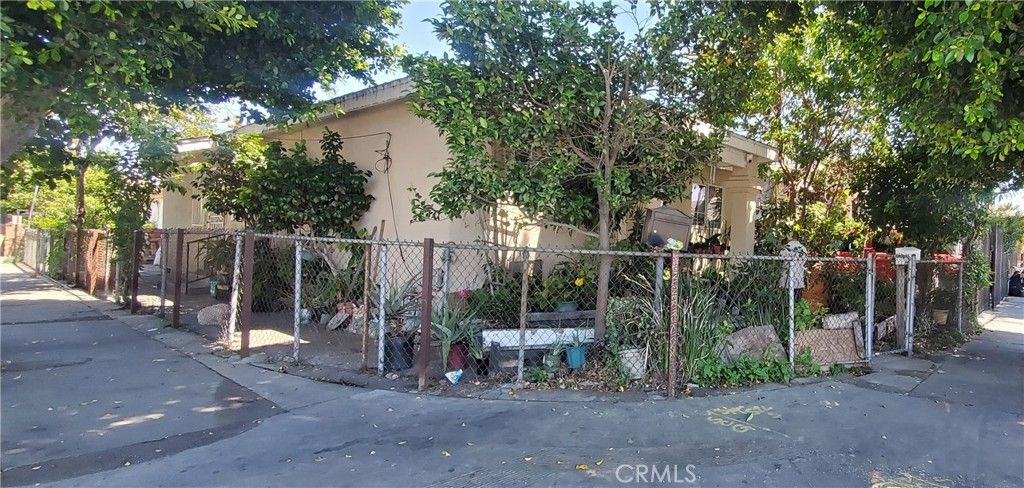 Photo of 6300 Holmes Avenue, Los Angeles, CA 90001 (MLS # MB25113528)